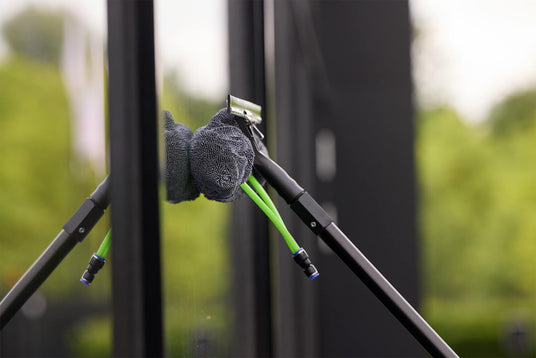 Using the drying cloth on a window