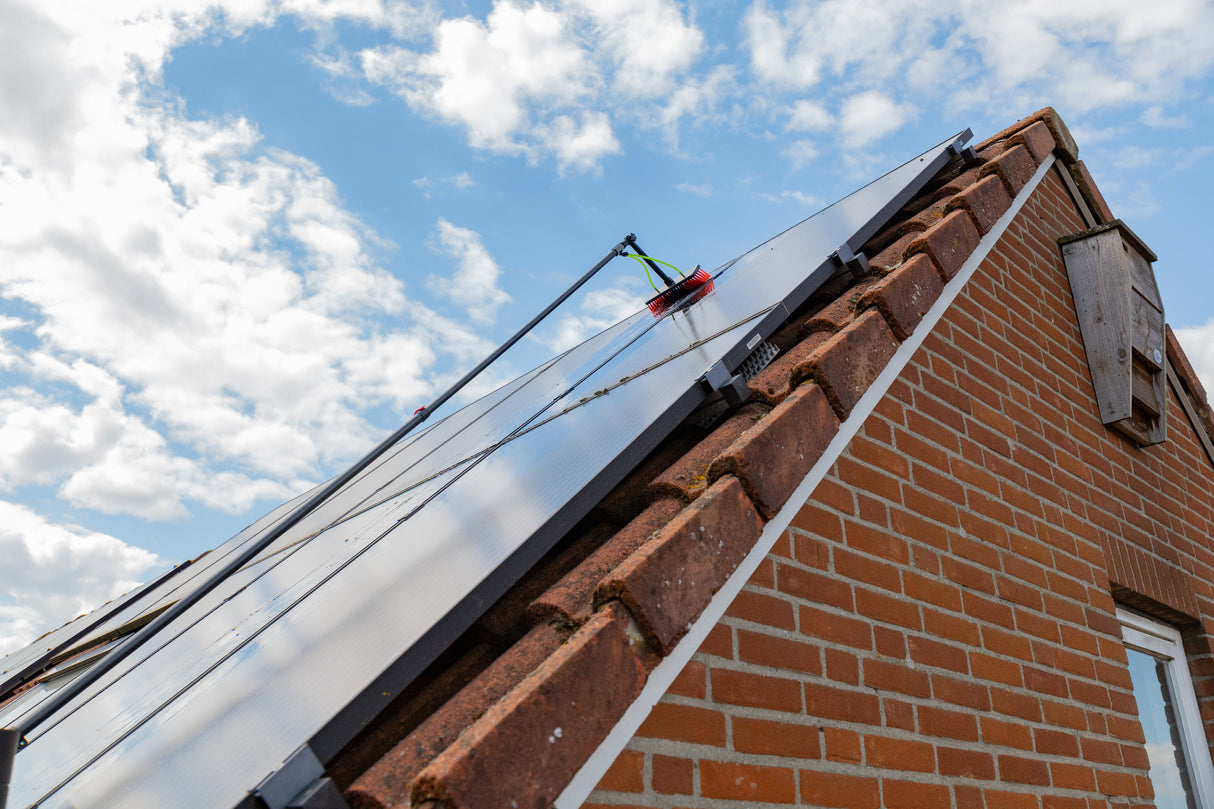 Cleaning solar panels using the standard brush