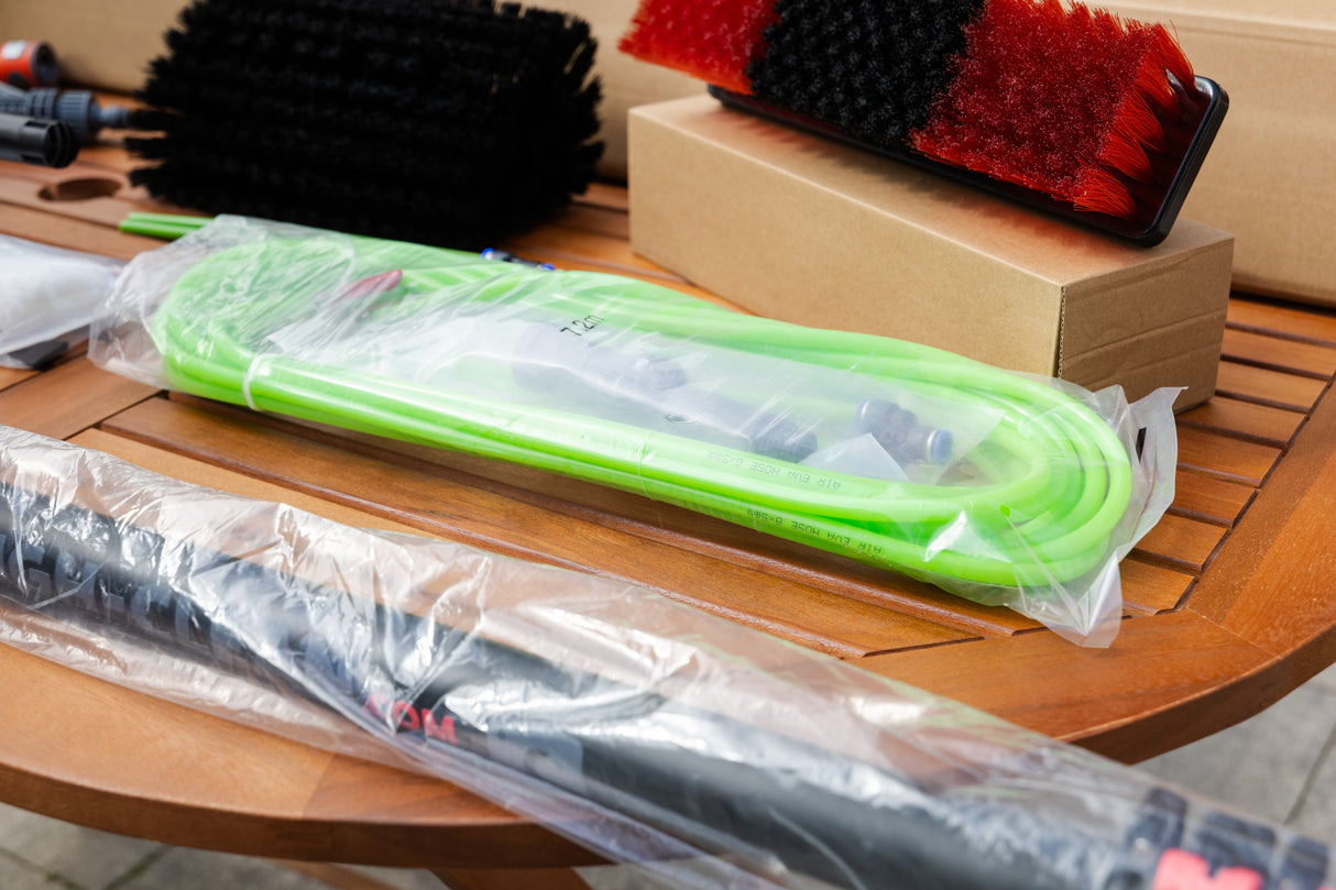 The water tube next to the standard brush