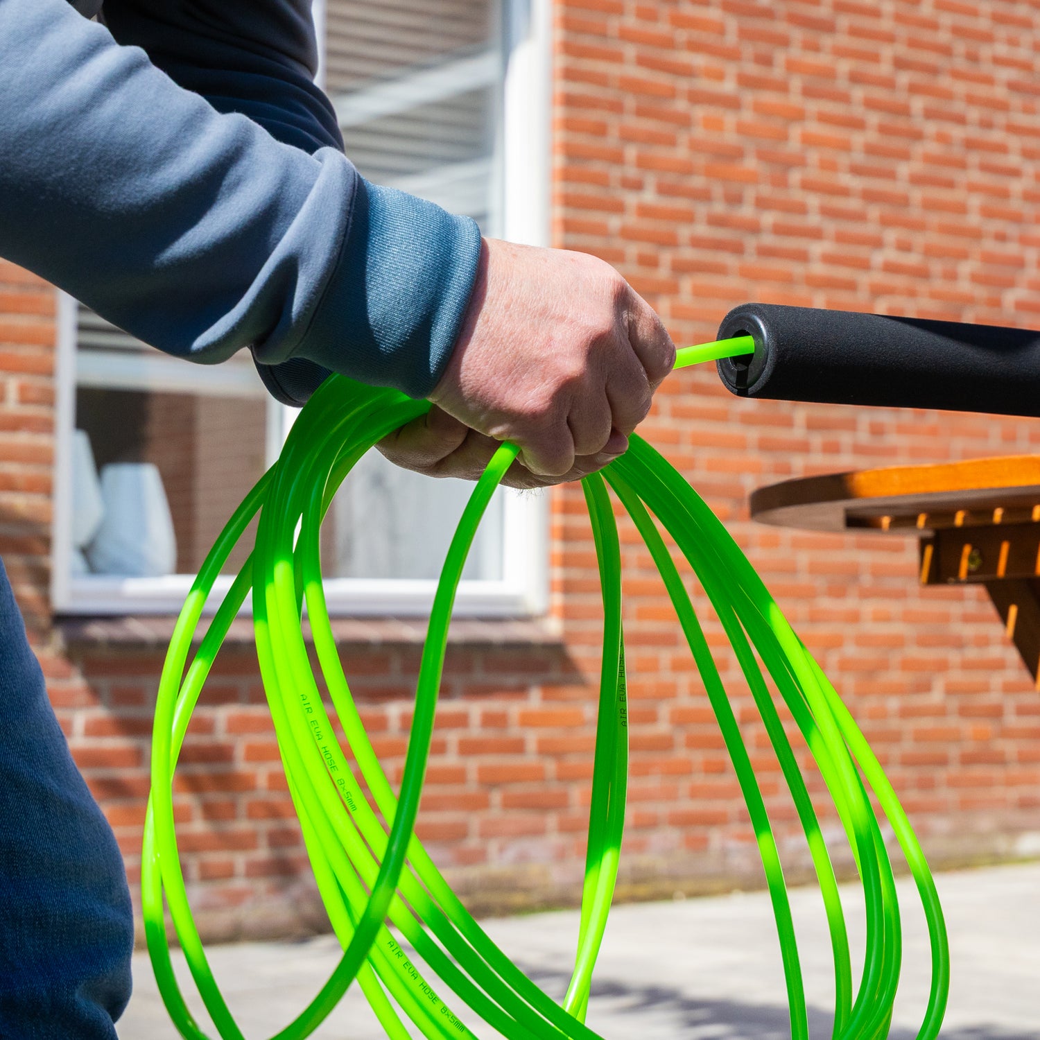Inserting a water tube into a telescopic pole