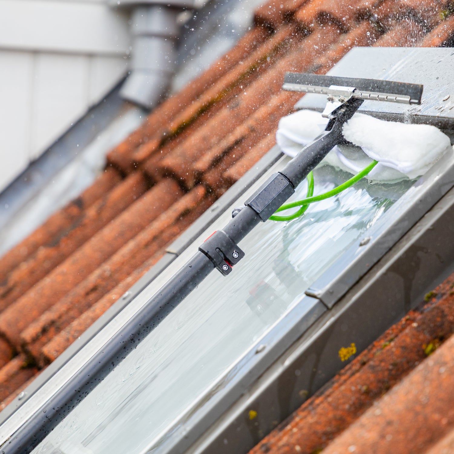 Using the washer-wiper set on a skylight