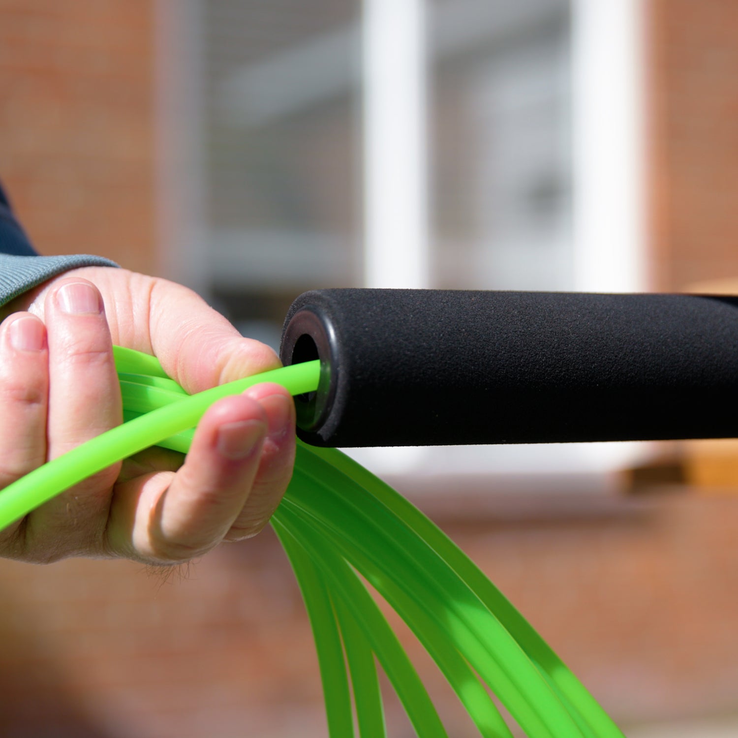 Inserting the water tube into a telescopic pole