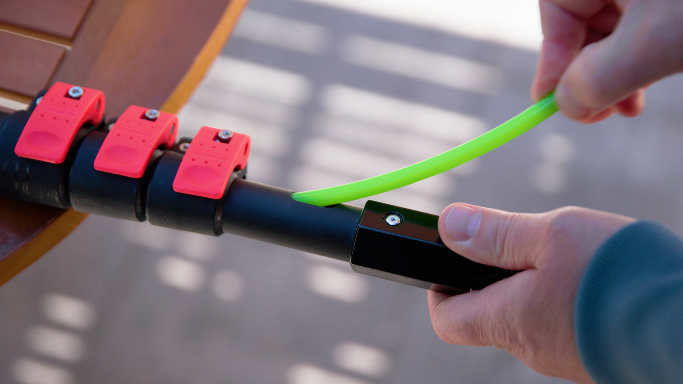 Inserting the water tube into a telescopic pole