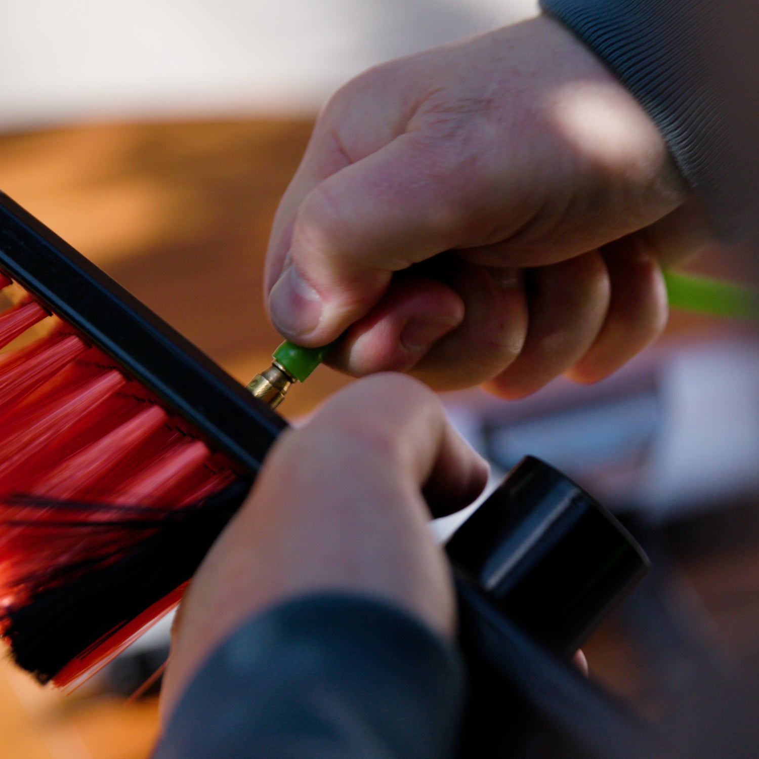Attaching a tube to a standard brush