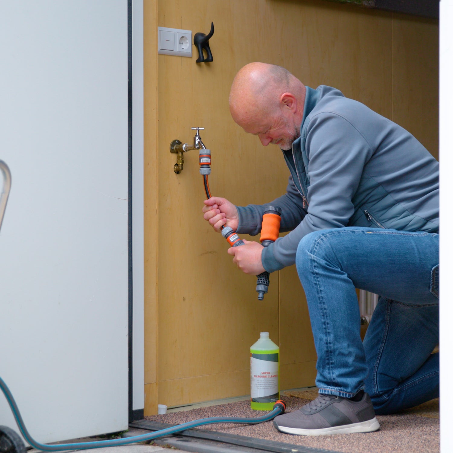 Attaching the soap dispenser to a faucet