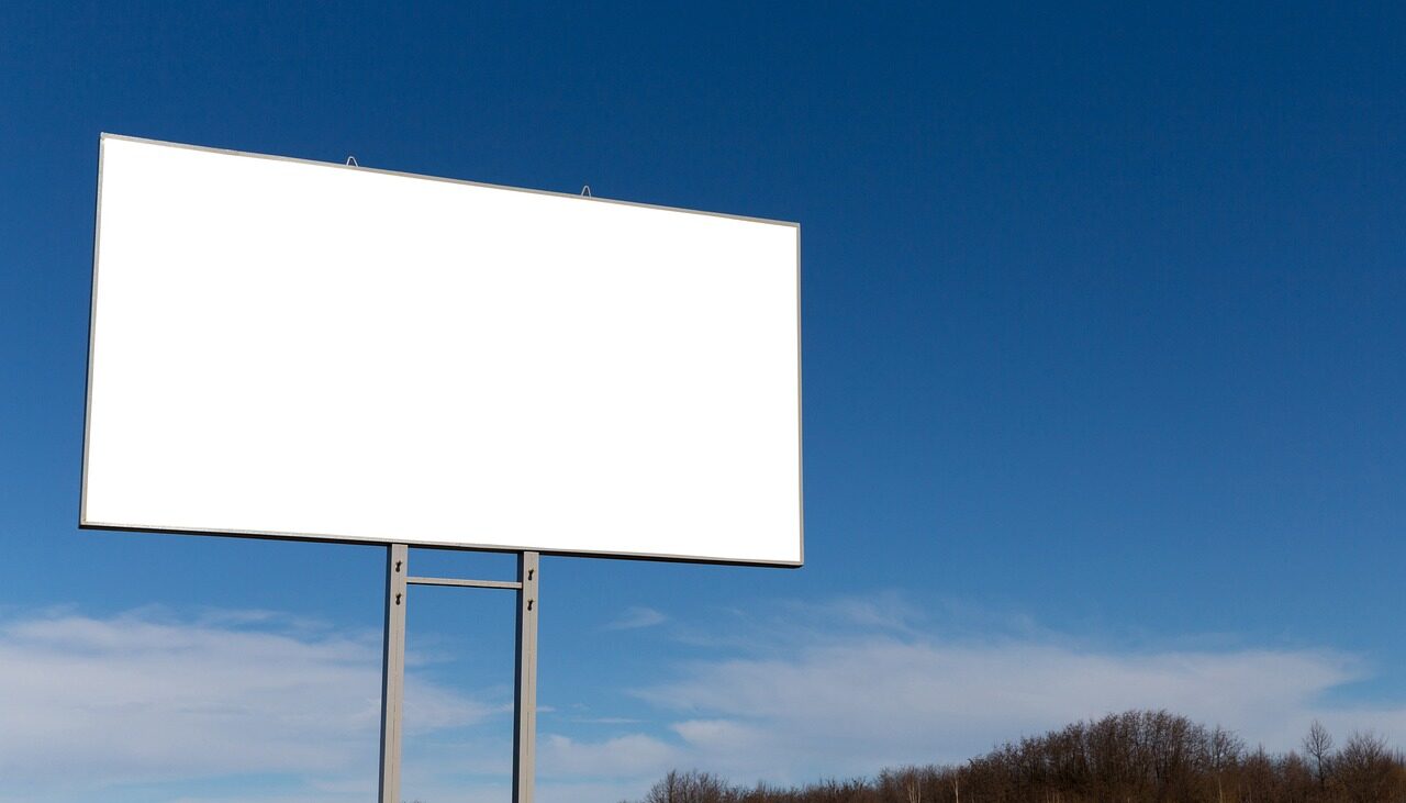 A white tall billboard