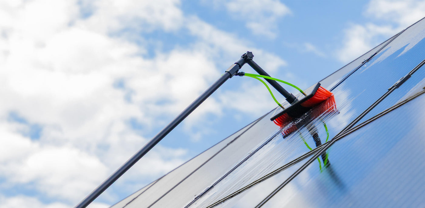 Cleaning solar panels using a standard brush