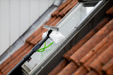 Using the washer of the washer-wiper set to clean a skylight