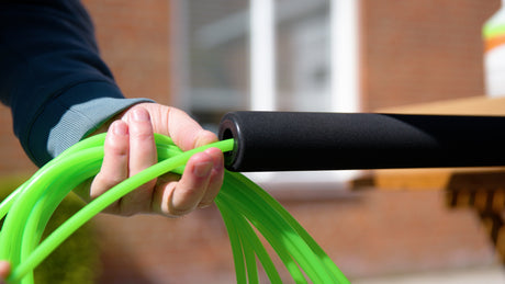 Inserting the water tube into a telescopic pole