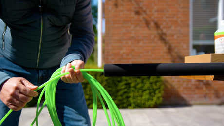 Inserting a water tube into a telescopic pole
