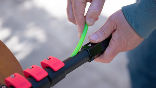 Inserting the water tube into a telescopic pole