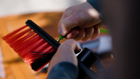 Attaching a tube to a standard brush