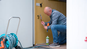 Attaching the soap dispenser to a faucet