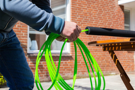 Inserting a water tube into a telescopic pole
